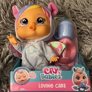 Cry Babies Jenna Loving Care Doll with Blue and Pink Outfit